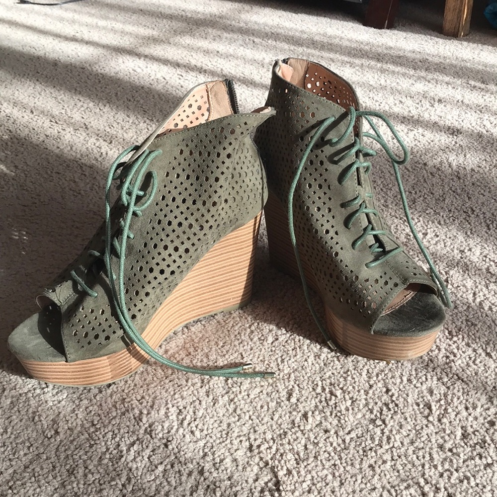 Never worn, brand new peep toe wedges